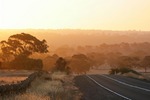 Sedan to Keyneton Road on sunset, South Australia