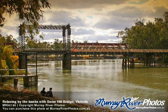 Relaxing by the banks with Swan Hill Bridge, Victoria