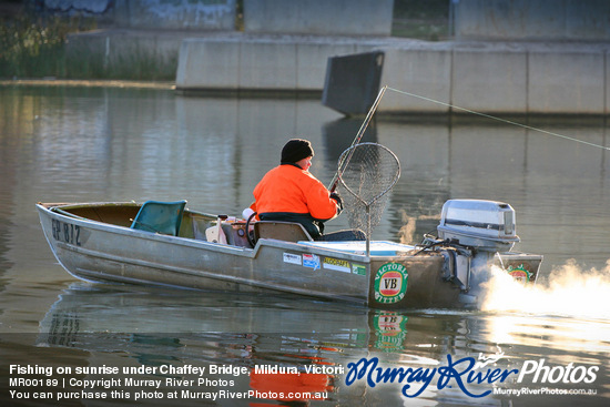 Fishing on sunrise under Chaffey Bridge, Mildura, Victoria