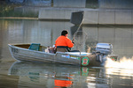 Fishing on sunrise under Chaffey Bridge, Mildura, Victoria