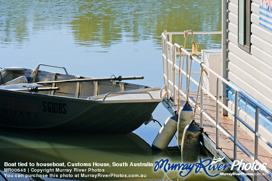 Boat tied to houseboat, Customs House, South Australia