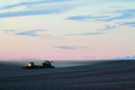 Harvester in the Mallee on sunset in Victoria