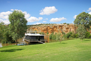 Houseboat and cliffs of Walker Flat, Murray River, South Australia