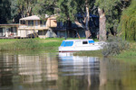 Riverboat and shacks near Swan Reach