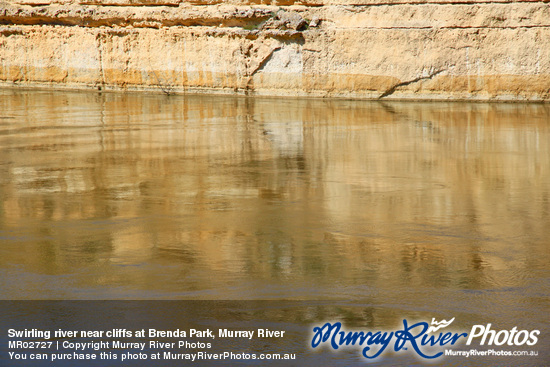 Swirling river near cliffs at Brenda Park, Murray River