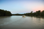 Houseboat on last light cruising near Wilkadene, Murtho, Riverland