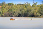 Kids kneeboarding near Headings Cliffs, Riverland