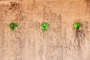 Bottles in the wall of The Hut at Wilabalangaloo