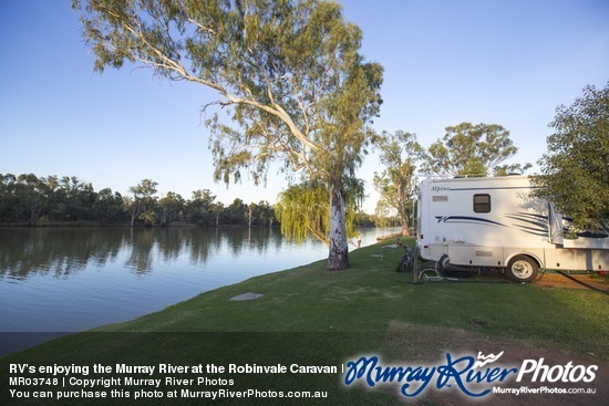 RV's enjoying the Murray River at the Robinvale Caravan Park, Victoria