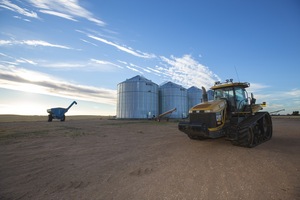 Wheat silos and header near Ouyen, Victoria